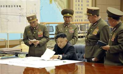 kim-jong-un-with-military-personnel-1-400x240-20130414-075203-530